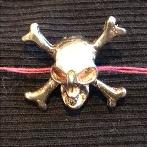 Quirky, fun Sterling silver skull charms, set of three. Adaptable to many uses!